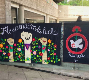 Different arpilleras are seen hanging, exhibited as part of an exhibition organized at the Memory and Human Rights Museum’s (MMDH) front yard in Santiago. 