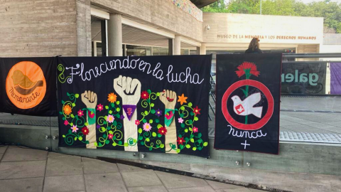 Different arpilleras are seen hanging, exhibited as part of an exhibition organized at the Memory and Human Rights Museum’s (MMDH) front yard in Santiago. 
